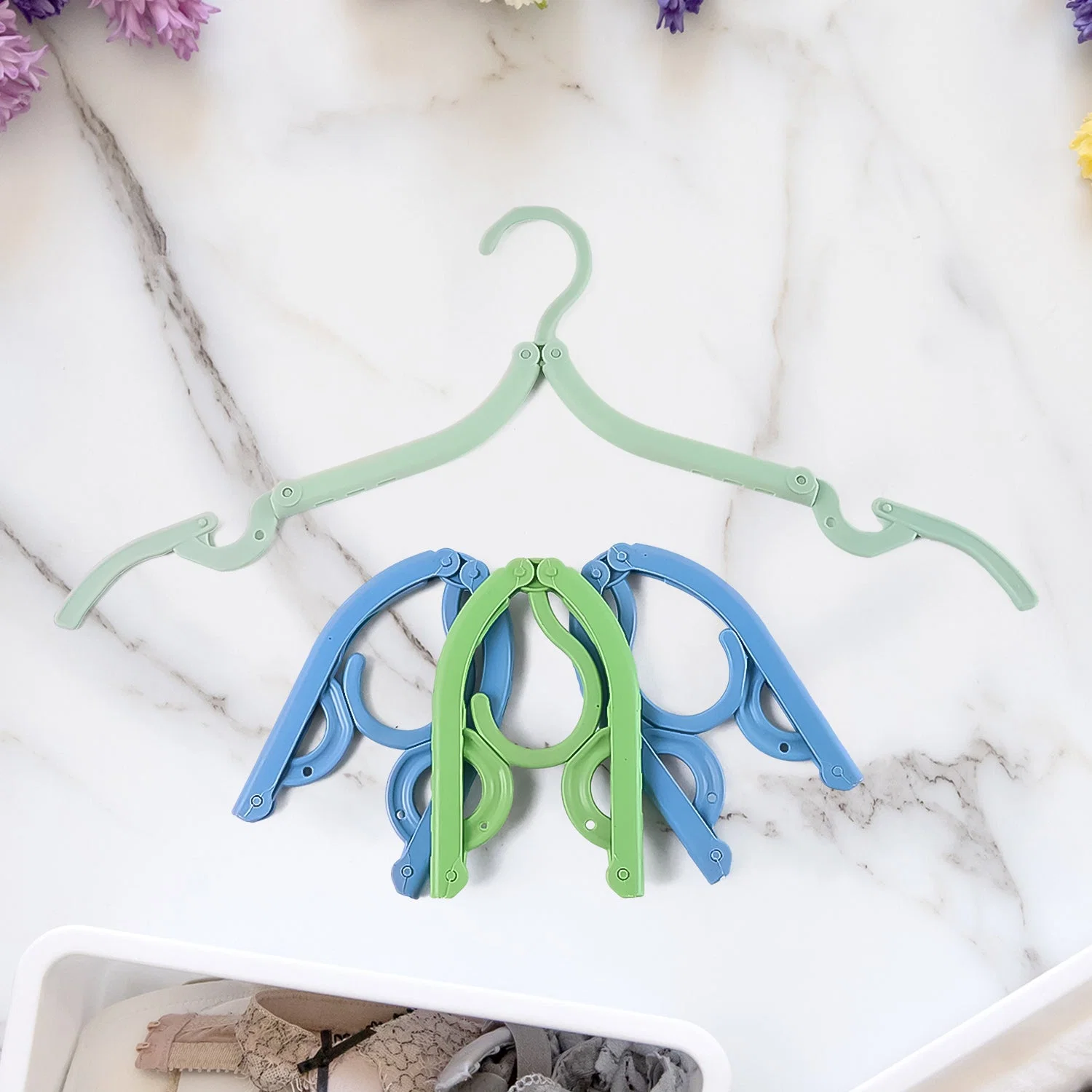 06-14354_folding_travel_hanger_4pc.webp Travel Hangers – Compact Foldable 4-Pack for Easy Storage - Image 6