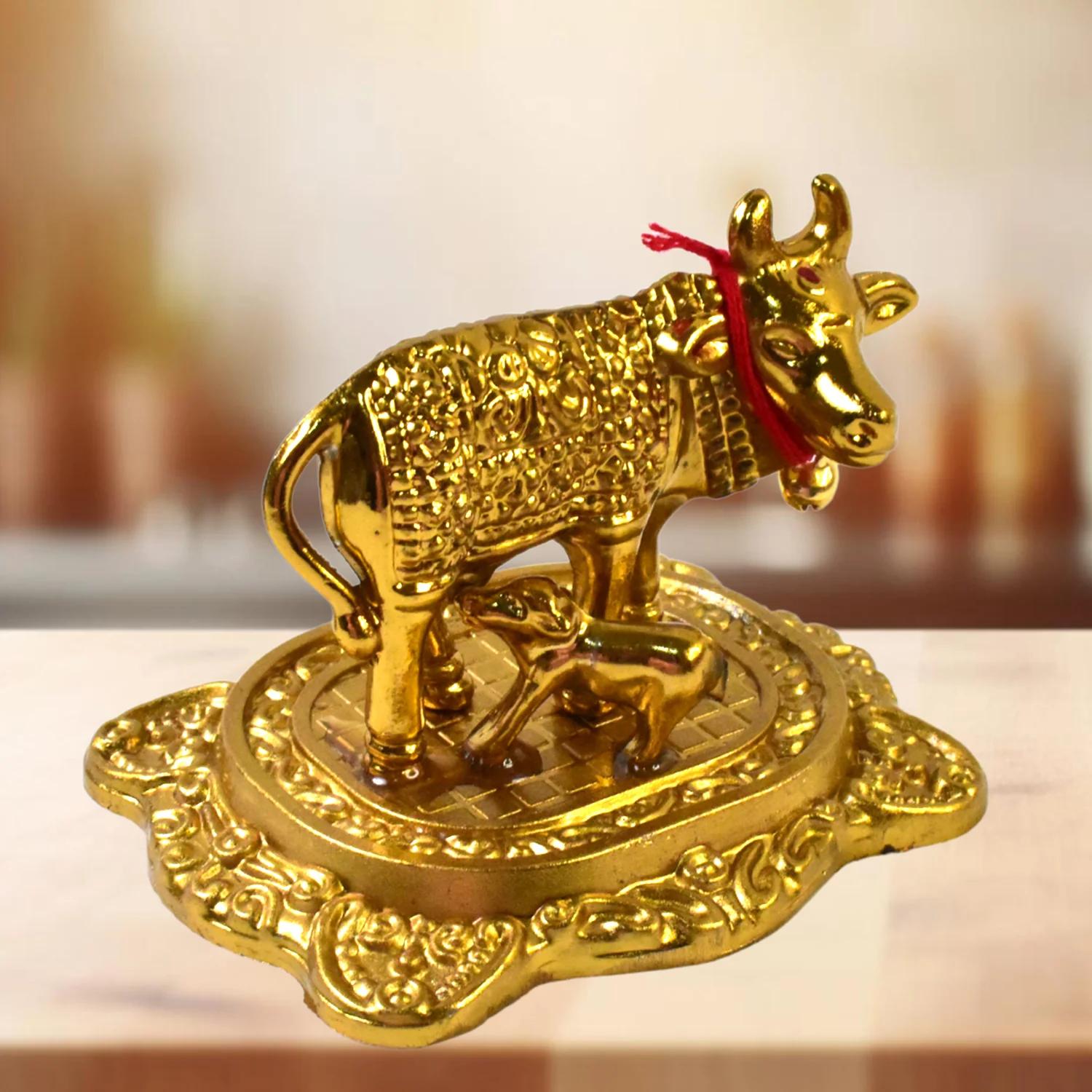 06-4081_metal_golden_kamdhenu_cow_n_calf.webp Golden Metal Kamdhenu Cow Showpiece – Spiritual Home Decor - Decorative Showpiece product image 6